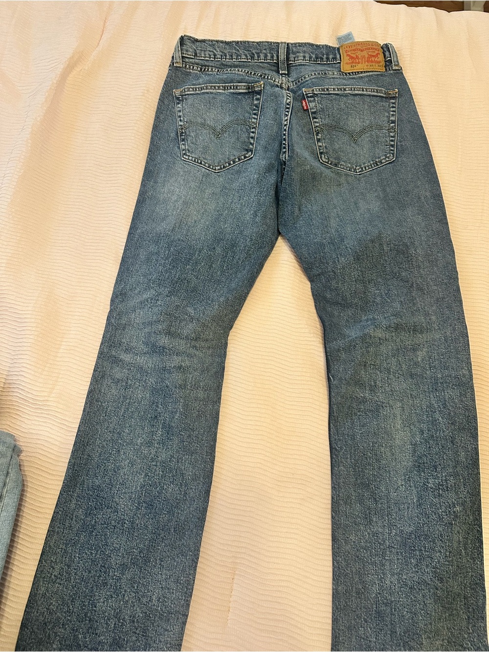 Levi's Men's Blue Bootcut Denim Jeans with Signature Back Pockets